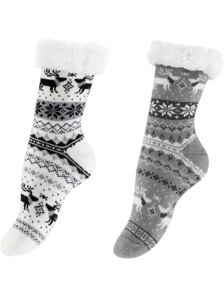 Socks with different motifs and ABS sole